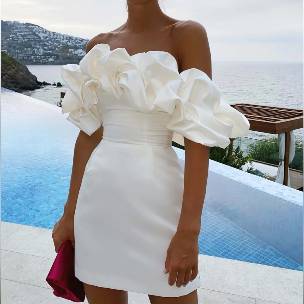 White dress from Post Meridiem UK. Size M. Brand new.